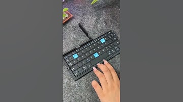 🎒⌨️ Foldable Bluetooth Keyboard 📱✨ #shorts