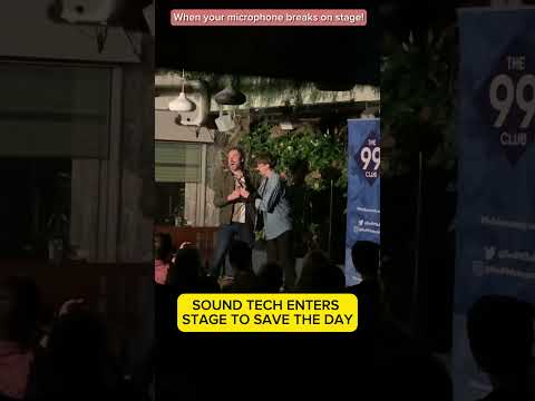 COMEDIANS MICROPHONES BREAKS IN A MIDDLE OF A SHOW ON STAGE