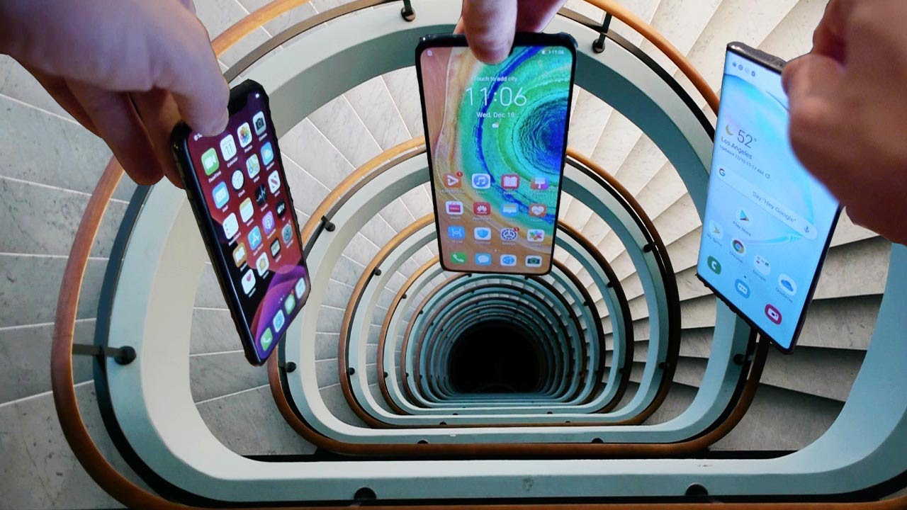 Dropping iPhone 11 Pro vs Note 10 vs Huawei Mate 30 Down Spiral Staircase Deep Hole - What Happens?