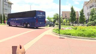 England team buses arrive to Prairie Village after landing in Kansas City