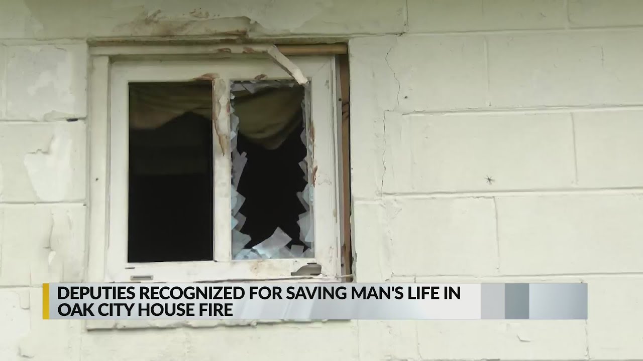 Martin County deputies save man from burning home - YouTube