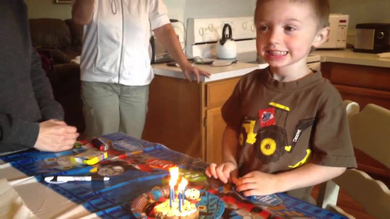 Coles 4th birthday blowing out his candles YouTube