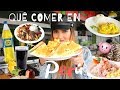 Colombiana probando comida peruana