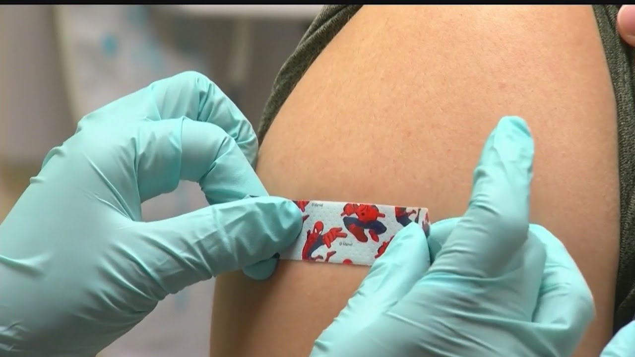 Doctors encouraging immunization awareness