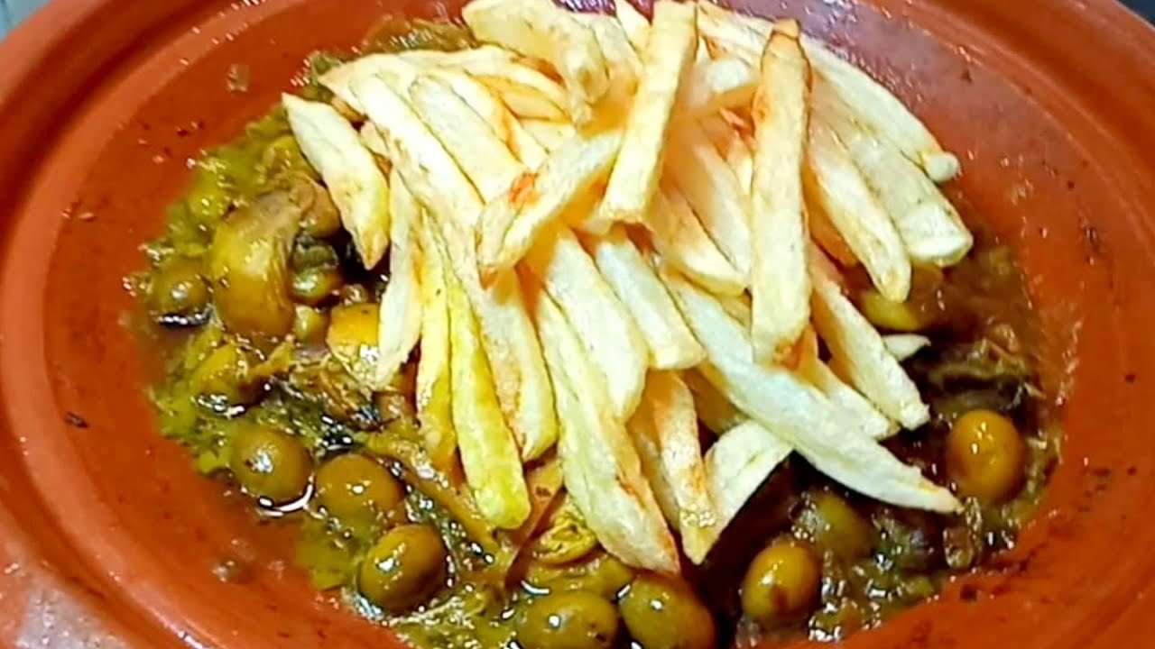 طاجين دجاج بالفريت والزيتون مدغمر ولذيذ والسر العجيب لي كيخلي البطاطس مقرمشة ومشارباش زيت