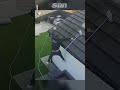 Hilarious moment dad falls from roof trying to clean windows