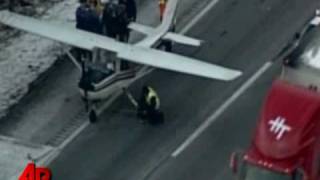 Raw Video: Traffic Plane Lands on Highway