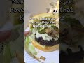 "The struggle is real. Trying to enjoy this mouthwatering burger while under intense surveillance.