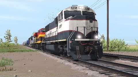 Trainz Simulator 3 BNSF Executive Mac Leads Manifest train with KCS ES44AC & CSX C40-8W trailing