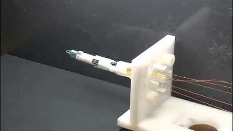 Design, development, and evaluation of an MRI-guided SMA spring-actuated neurosurgical robot: Part 1