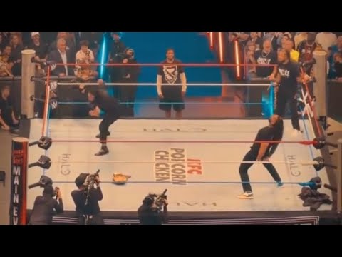 Roman Reigns Spears Seth Rollins At WWE SNME Highlights 