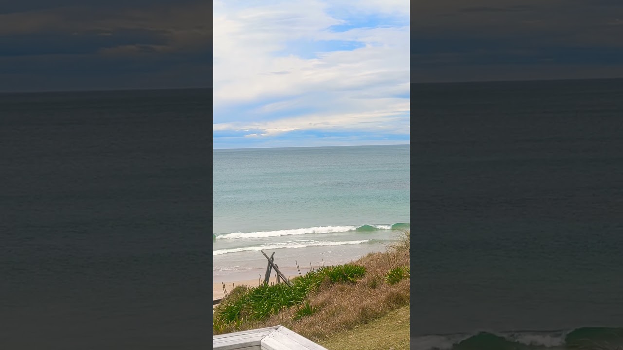 Beautiful blue sky over ocean waves