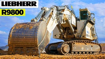 The World’s Biggest Excavator in Action (LIEBHERR R 9800 Excavator Loading Trucks)