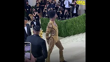 Watch Lil Nas X transform into his gold bodysuit at the MET Gala l GMA