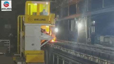 Weijing tilting pouring machine works with Chinese Zhuxin horizontal line