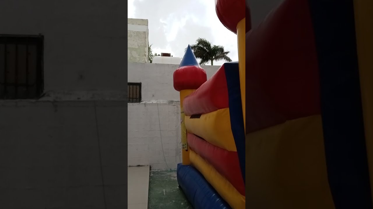 My girlfriend and I jumping in bounce house