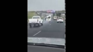 Wrecked taxi cruising on South African Road
