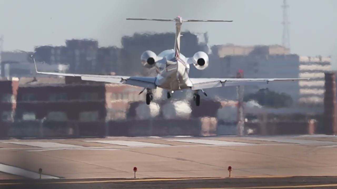 NetJets 437 Embraer Phenom 300 N437QS Landing at Dallas Love Field From Houston DWH Memorial