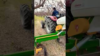 Plowing A field with a tractor