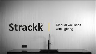 Manual Strackk wall shelf with lighting