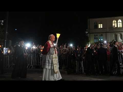 Pope joins pilgrims in Lourdes candlelit rosary as 150,000 attend mass