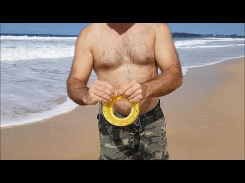 Hand line beach fishing with pipis Australia