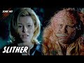 Elizabeth Banks finds Michael Rooker's alien body in Slither