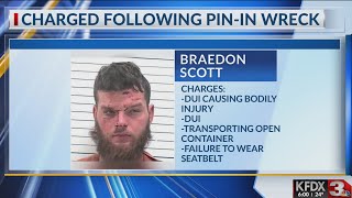 An intoxicated driver now facing charges after passenger was partially ejected