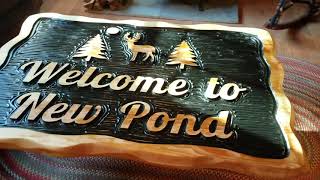 Custom carving a HUGE cedar sign!