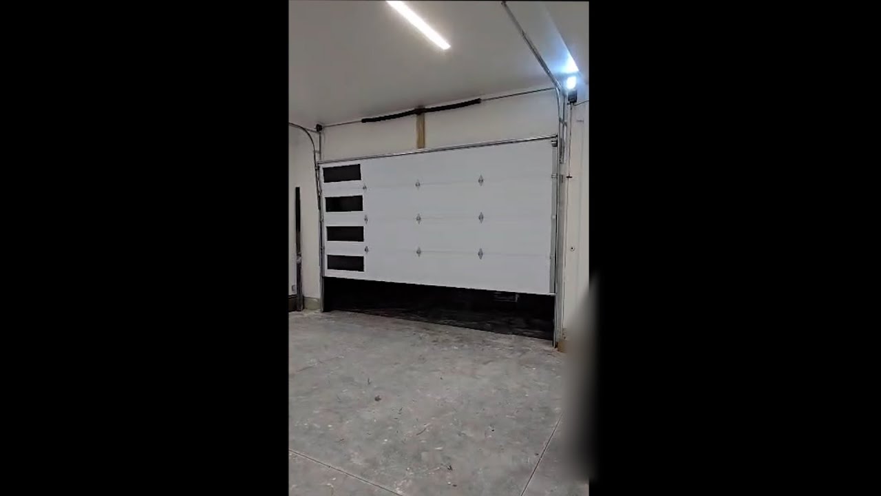 Skylink Side Mount Garage Door Opener (SMO #16)_Door size is 16' x 8' with a 4' high lift