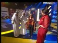هدى حسين هوشه في الكواليس مع احد الفنانين 