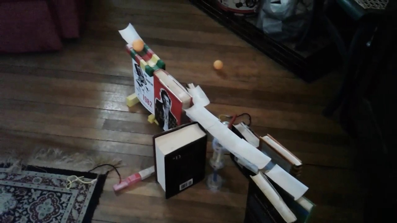 Mini rube goldberg machine - YouTube