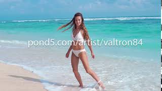 Portrait of pretty beautiful sport fashion woman in white bikini posing in summer near the sea and screenshot 2