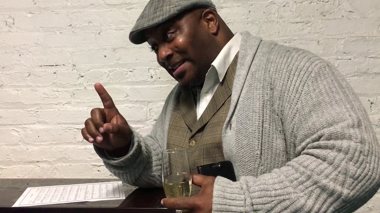 DeMone singing Cats In The Cradle at the Artist Co-Op