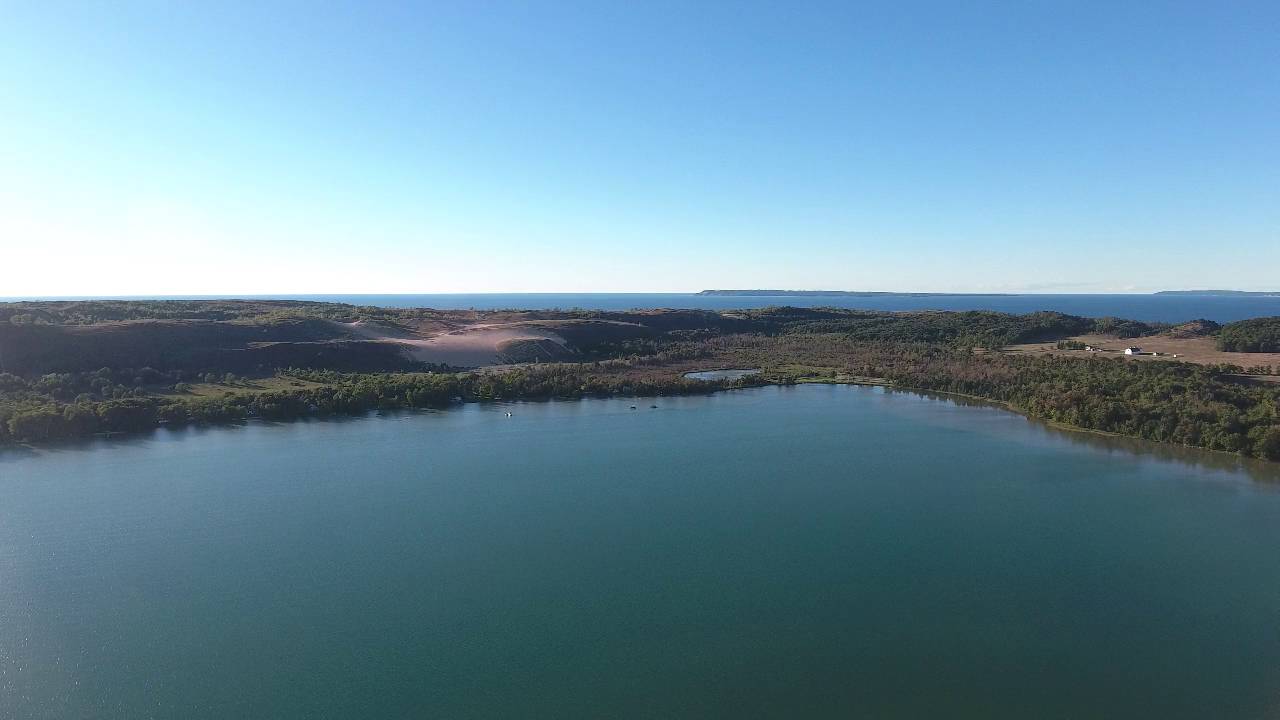 A drone on Glen Lake overlooking Lake Michigan