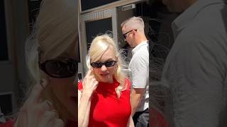 Anna Farris Channels Marilyn Greeting Fans In A Red Dress