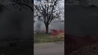 A train in Tennessee, US, crashes into a truck and derails