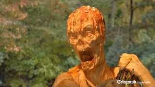 Pumpkins carved into zombies for Halloween