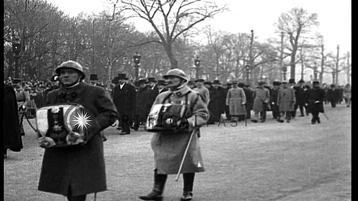 A funeral procession including soldiers and states...