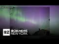 Photos show northern lights in night sky over parts of New York