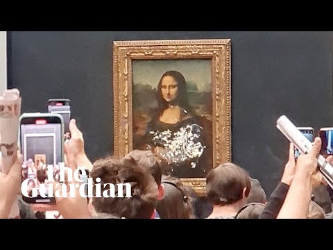 Mona Lisa smeared with cake in apparent climate protest at the Louvre