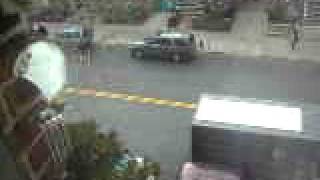 UPS truck driver tossing out packages