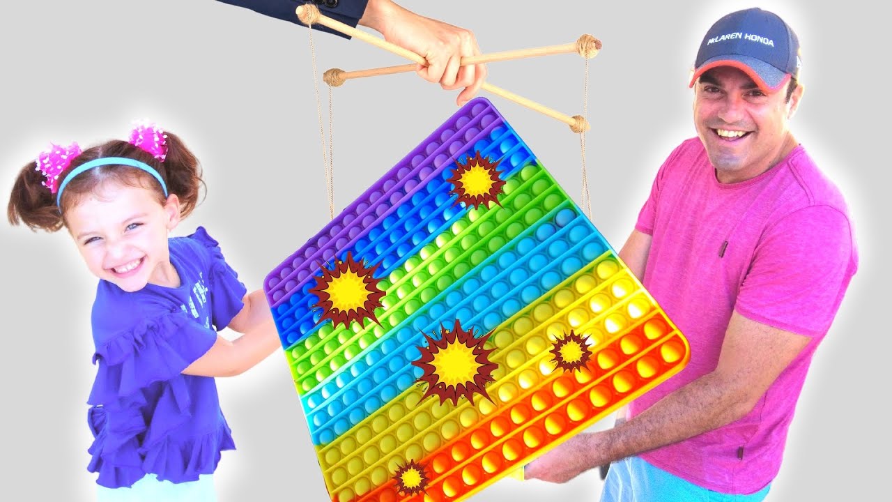 Pop Its Are Magically Appearing While Elisa is Studding the Shapes. Fun Video For Kids