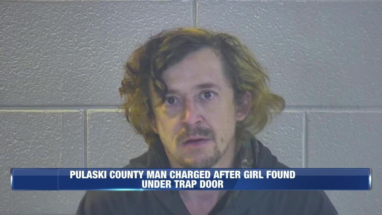 Pulaski County man charged after girl was found under trap door - YouTube