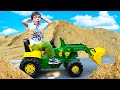 Funny Stories about Tractor John Deere - The Tractor helped to remove the sand