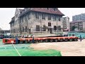 Chinese city relocates 100-year-old nunnery using self-propelled modular transporters.