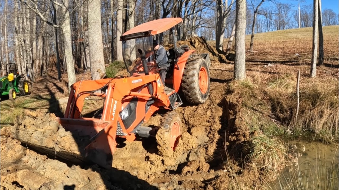Reclaiming a Small Pond Using only a Kubota Tractor! - YouTube