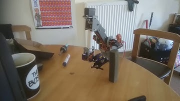 Sainsmart 6-dof robot arm manipulating a bar