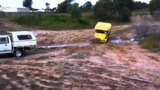 Triton pulling hj47 out of bog hole