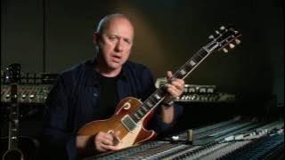 Mark Knopfler on guitar